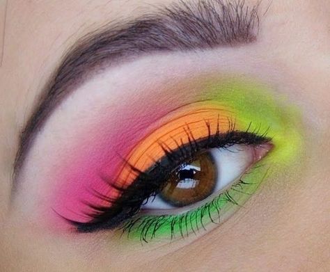 brown-eye-seen-in-extreme-close-up-and-decorated-with-eyeshadow-in-four-neon-hues-pink-orange-yellow-green-black-mascara-and-eyeliner Makeup Looks Brown, Trendy Eye Makeup, Makeup Verde, Extreme Make-up, Carnaval Make-up, Neon Eyeshadow, Festival Makeup Glitter, Neon Makeup, Eyeshadow For Brown Eyes