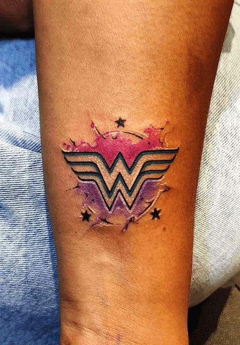 Wonder Woman Tattoos For Women, Wonder Woman Logo Tattoo, Wonder Woman Tattoos, Ww Tattoo, Purple Ribbon Tattoos, Woman Tattoo Ideas, Woman Tattoo Design, Wonder Woman Tattoo, 2025 Bride