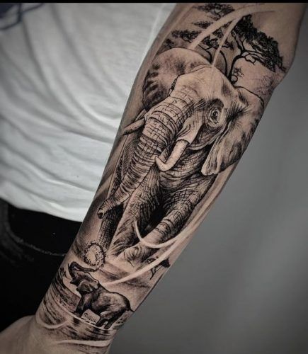 21 Elephant Tattoos on Forearm Ideas: Embrace the Power and Grace Tattoos On Forearm, Realistic Elephant Tattoo, Skull Thigh Tattoos, Tattoo Elephant, Jungle Tattoo, Africa Tattoos, Animal Sleeve Tattoo, Tier Tattoo, Cool Nature