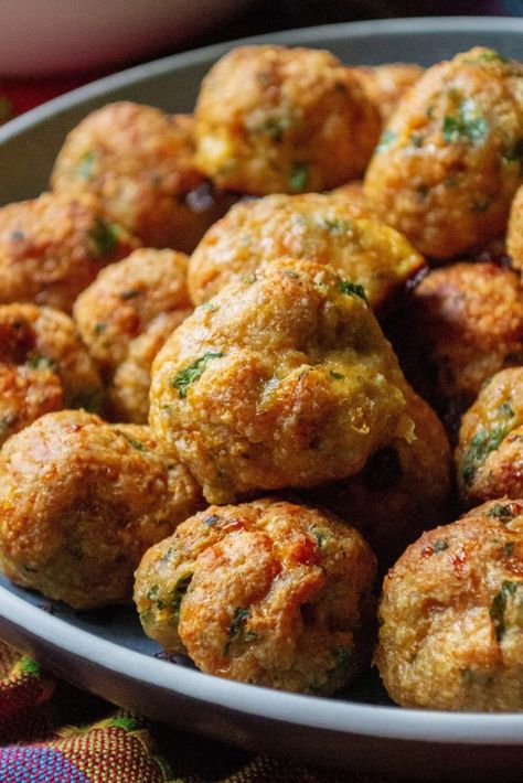 Keto Chicken Meatballs are your favorite ground chicken meatballs made with everyday ingredients but without the breadcrumbs.  Loaded with spices, parmesan cheese and fresh herbs, these Keto Chicken Meatballs are low-carb, gluten free and keto friendly but you would never even know it! | A Wicked Whisk #chickenmeatballs #ketochickenmeatballs #lowcarbchickenmeatballs #ketochickenmeatballslowcarb #ketochickenmeatballsbaked #ketochickenmeatballsglutenfree #lowcarbchickenmeatballshealthy Chicken Cheese Meatballs, Bariatric Chicken Meatballs, Low Carb Meals Ground Chicken, Chicken And Cheese Meatballs, Keto Recipes Using Ground Chicken, Ground Chicken And Pork Meatballs, Low Carb Recipes With Ground Chicken, Keto Chicken Cheese Balls, Keto Chicken Balls