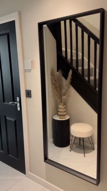 Black Doors On Landing, Black White Hallway, Black Door Interior Design, Beige And Black Hallway, White And Black Hallway, Black Doors Hallway, Black Walls Hallway, Hallway With Black Doors, Black And Beige Hallway