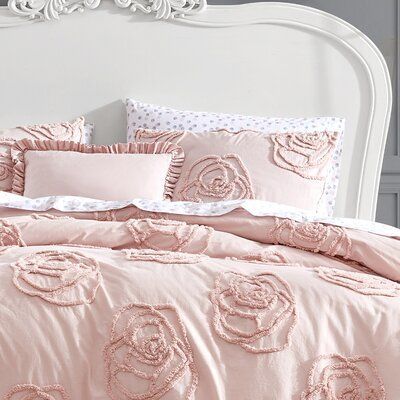 Add a beautiful upgrade to your bedroom with the Rambling Rose Pink Reversible 3 Piece Duvet Cover Set from Betsey johnson. Constructed with soft and breathable cotton, this trendy but understated set features a beautiful tufted rose design all over the blush pink ground with a solid blush pink reverse. The included bonus ruffle-trimmed throw pillow cover completes the look in this stunning ensemble. The duvet cover features a zipper closure and additional inner corner ties to secure the duvet i Breakfast Pillow, Ivory Duvet Cover, Ivory Duvet, Rose Duvet Cover, Daybed Cover Sets, Rambling Rose, Pink Comforter, Pink Duvet, Pink Duvet Cover