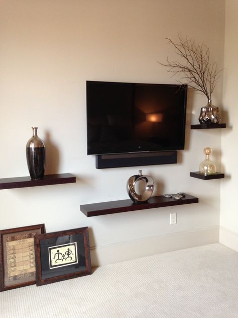 3rd Floor Master Bedroom.  Another view of the floating shelves and hanging flat screen TV. Bedroom Tv Wall Ideas, Living Room Tv Wall Decor, Ruang Tv, Tv Mounted, Bedroom Tv Wall, Floating Shelves Living Room, Living Room Decor Rustic, Flat Screen Tv, Tv Wall Decor