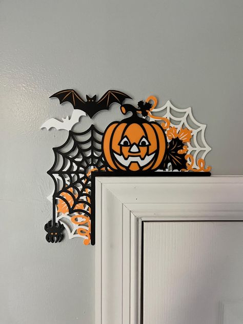 Spookify Your Home with 3D Printed Halloween Door Corner Decorations! Transform your home into a haunted haven with our 3D printed Halloween door corner decorations! These unique and spooky adornments are perfect for adding a touch of eerie elegance to your Halloween decor. Features:    * Unique Design: Each decoration is intricately designed to fit perfectly on the corners of your doors,            creating a seamless and spooky effect.     * High-Quality Material: Made from durable, eco-friend Office Decorations Halloween, Christmas 3d Printing Ideas, Door Corner Decor, 3d Printing Ideas Halloween, 3d Printed Fall Decorations, 3d Printed Fall Decor, Halloween 3d Print, 3d Printed Halloween, 3d Printer Halloween Decor