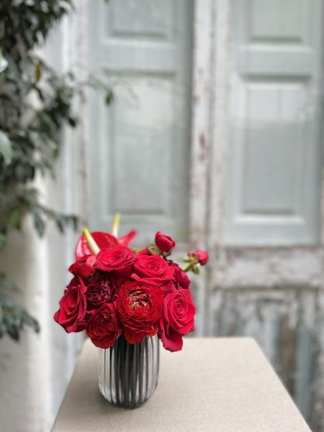 Red flower centerpiece Red Centerpieces, Low Centerpieces, Small Centerpieces, Flower Centerpiece, Red Flower, Flower Centerpieces, New Years Party, Red Floral, Red Flowers