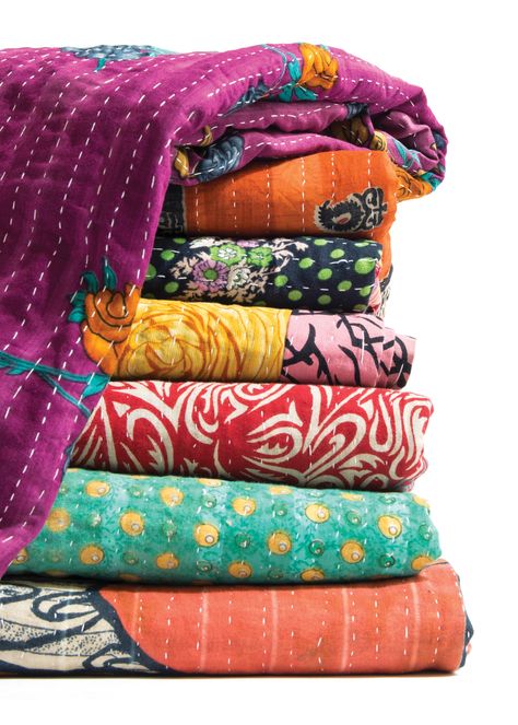 With their whimsical fabrics and uneven stitching, kantha throws are fun, colorful accessories. Yet like other quilting traditions, the art form has rich cultural roots. And it starts in India and Bangladesh. Boho Couture, Sari Quilt, Quilts Vintage, Bohemian Quilt, Kantha Throw Blanket, Boho Quilt, Indian Quilt, Reversible Blanket, Kantha Quilts