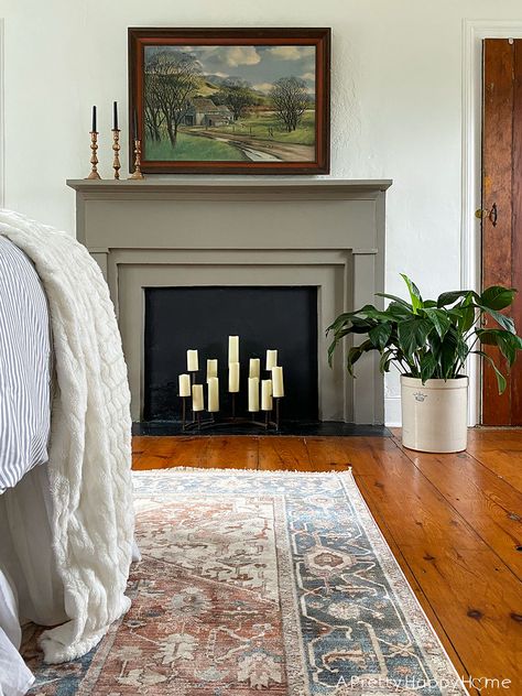 Create a farmhouse style bedroom with dusty reds and blues. Fireplace Mantel Styles, Bedroom Fireplaces Master, Grey Mantle Fireplace, French Farmhouse Fireplace Ideas, Paint Wood Fireplace, Traditional Farmhouse Fireplace, Best Fireplace Colors, Mantle With No Fireplace Ideas, Farmhouse Bedroom Fireplace