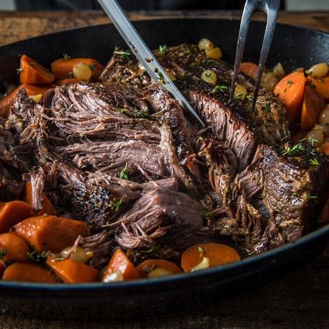 Chuck roast in a Dutch oven with potatoes, carrots, onions as well as aromatics and chicken stock, and let it cook for up to 5 hours. Traeger Pellet Grills, LLC Traeger Roast, Roast Beef Ideas, Oxtail Ragu Recipe, Smoked Pot Roast, Oxtail Ragu, Smoked Meals, Smoked Beef Roast, Trager Grill, Vegetable Cocktails