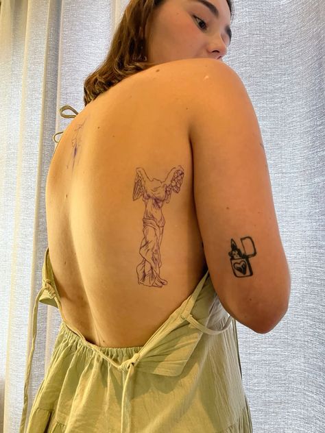 Full Of Life Tattoo, Goddess Of Victory Tattoo, Behind The Shoulder Tattoo, Lady Of The Lake Tattoo, Back Sticker Tattoo, Saltburn Tattoo, Greek Sun Tattoo, Nike Goddess Tattoo, Cool Tattoo Placement Women