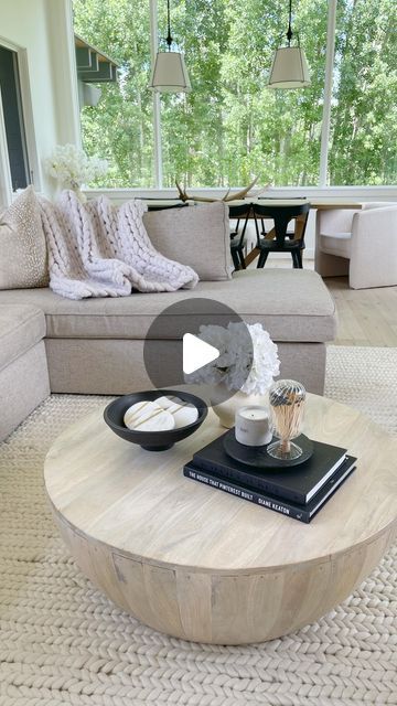 Kasey Dixon on Instagram: "HOME \ round coffee table styling! I also decorate using three moments with this shape: books w/ tray candle, blooms and a bowl! Keeping the colors neutral and black to stay in line with my modern country decor🤍🖤 Here’s how to SHOP! 1. Comment “shop” to get links sent directly to your DMs 2. Click the link in my bio @sbkliving and select “shop my reels” 3. Head over to my @shop.ltk shop and follow me “sbkliving” #livingroomdecor #livingroomideas #livingroomstyling #livingroomstyle #coffeetabledecor #coffeetablestyling #moderncountry #moderncountrystyle https://liketk.it/4eTPe" How To Decorate A Round Coffee Table, Round Coffee Table Styling, Modern Country Decor, Modern Country Style, Coffee Table Styling, Candle Tray, Modern Country, Living Room Style, Decorating Coffee Tables