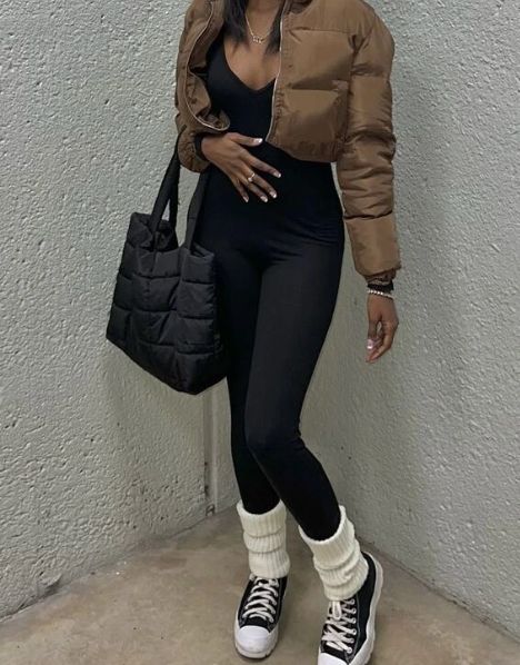 Jumpsuit And Converse Outfit, Leg Warmers Over Converse, Black Leggings With Leg Warmers, Fall Outfits With Leg Warmers, Jumpsuit With Leg Warmers, Converse Leg Warmers, Leg Warmers Outfit Black Women, Winter Outfits Leg Warmers, Black Jumpsuit Outfit Fall