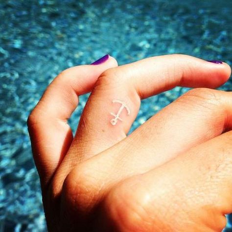 White Wave Tattoo, Decide Tattoo, White Finger Tattoos, Tiny Anchor Tattoo, Cross Finger Tattoos, Small Anchor Tattoos, Tattoo On Finger, Cross Tattoo On Wrist, Tattoo On Wrist