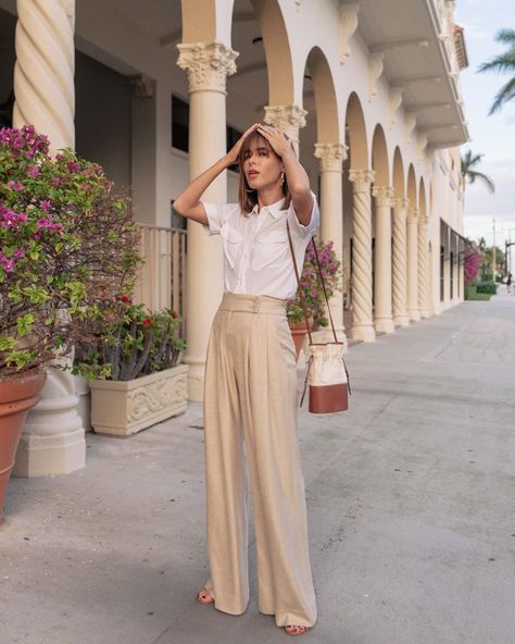 Classic Spring 2020 work outfit Stephanie Hill (@thestylebungalow)  #workbasics #workwear Trousers Outfit Work, Satin Pants Outfit, Chic Business Attire, Office Fashion Summer, Wide Leg Trousers Outfit, Style Bungalow, Loose Pants Outfit, Fashion Work Outfit, Trousers Outfit