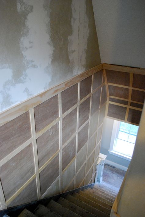 do wainscot on ceiling in entry way and board and batten like this to cover slanted weird ceiling Square Board And Batten, Board And Batten Stairwell, Basement Decoration, Architecture Renovation, Dream Basement, Casa Country, Basement Stairs, Basement Makeover, Basement Ceiling