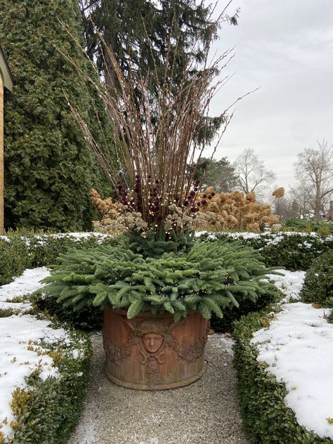 garden sculpture | Deborah Silver & Co. Yellow Twig Dogwood, Red Twig Dogwood, Deborah Silver, Twig Dogwood, Plastic Grass, Dogwood Branches, Winter Arrangements, Outside Plants, Garden Works