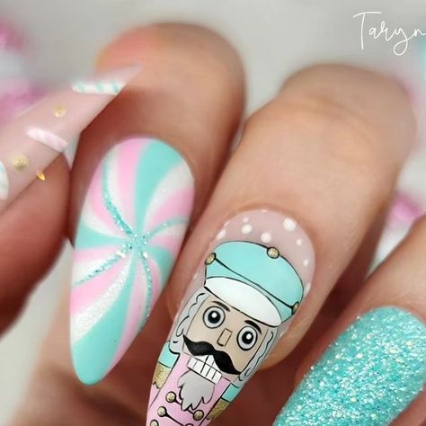 Taryn VanAlfen on Instagram: "Cute Christmas Nutcracker 🥜 #nutcracker #thenutcracker #nailsnailsnails #creativity #utahnails #nailtrends #christmasnails #christmasnailart #pinknails #tiffanyblue #candycanes #handdrawn" Nutcracker Nail Art Christmas, Pink Nutcracker Christmas Nails, Christmas Cookie Nail Art, Pink Nutcracker Nails, Nutcracker Christmas Nails, Christmas Nails Nutcracker, Christmas Fingernail Ideas, Pastel Winter Nails, Nutcracker Ballet Nails