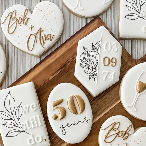 Leda Davis on Instagram: "Out of my element! Usually I’m asked to do birthdays and the occasional baby shower! But this is my 3rd request recently for anniversary/wedding sets. How did I do?!  Inspo: @ellascookiejar @sugarsbyshell   #anniversary #anniversarycookies #sugarcookies #cookie #cookies #royalicingcookies #royalicing #decoratedsugarcookies #decoratedcookies #cookiesofinstagram #houstonsugarcookies" 50 Th Anniversary Decorated Cookies, 60th Birthday Party Cookies, 50th Anniversary Cookie Ideas, Anniversary Party Cookies, 40th Wedding Anniversary Cookies, Anniversary Cookies Ideas, Vow Renewal Cookies, 25th Wedding Anniversary Cookies, 40th Anniversary Cookies