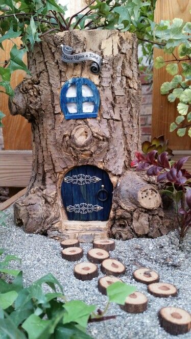 First attempt at tree stump fairy house. Tree Stump Gnome House Ideas, Log Fairy House, Knome Houses Tree Stump Diy, Gnome House Tree Stump, Tree Trunk Gnome House, Gnome House Tree Stump Fairy Homes, Gnome Home Tree Stump, Diy Fairy House Roof Tree Stumps, Tree Stump Decor