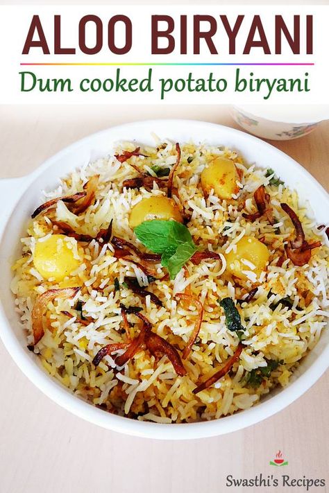 Aloo Biryani is a delicious dum cooked layered biryani made with basmati rice, spices, herbs, yogurt and baby potatoes. #indian #rice via @swasthi Aloo Biryani, Rice Biryani, Aloo Dum, Vegetarian Biryani, Rice Spices, Hyderabadi Biryani, Variety Rice, Pakistani Dishes, Indian Rice Recipes