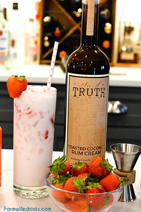 Pink drink cocktail is a yummy toasted coconut rum cream mixed with strawberries and sparkling water to make this delicious strawberry coconut cream rum cocktail. #CoconutRum #Coconut #PinkDrink #StrawberryCocktail #Cocktails #Drinks #Rum #HardTruthDistillery Strawberry Rum Drinks, Coconut Wine, Wine Mixed Drinks, Coconut Rum Drinks, Rum Drinks Recipes, Valentine Drinks, Rum Cream, Coconut Drinks, Pink Drink