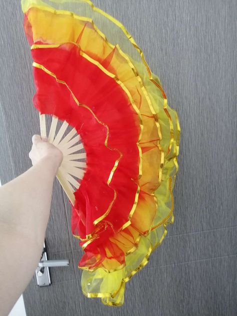 This is a Chinese fan - used as a stage performance, such as dancing, accompaniment or special movie props. It's made of silk and comes in various colors    Factory production, support to customize various sizes of colors and printed logos, our company supports wholesale and retail.  Wechat: ysnlgssy  whatsapp:13911045129  E-mail: mochilapang@outlook.com Dance Props, Chinese Fan, Stage Props, Solo Performance, Stage Performance, Movie Props, Hand Fan, Red Yellow, Dancing