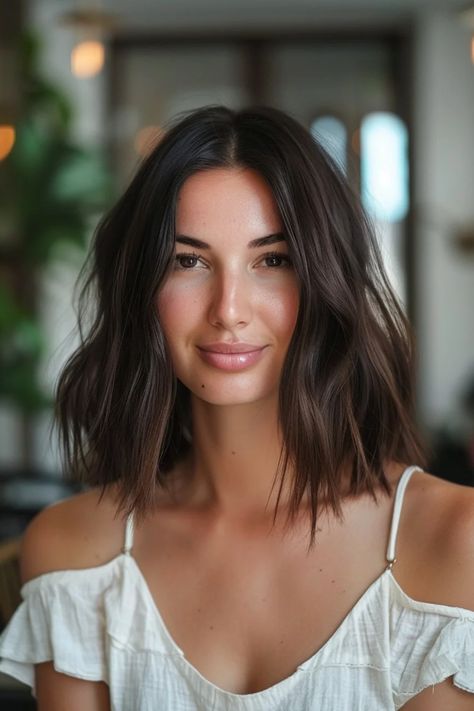 Woman with shoulder-length dark hair in a white off-the-shoulder top, smiling softly indoors. Highlights Color Ideas, Caramel Highlights On Dark Brown, Dark Brown Short Hair, Mocha Balayage, Black Hair With Brown Highlights, Hair With Brown Highlights, Highlights Hair Color Ideas, Highlights Inspiration, Short Dark Brown Hair