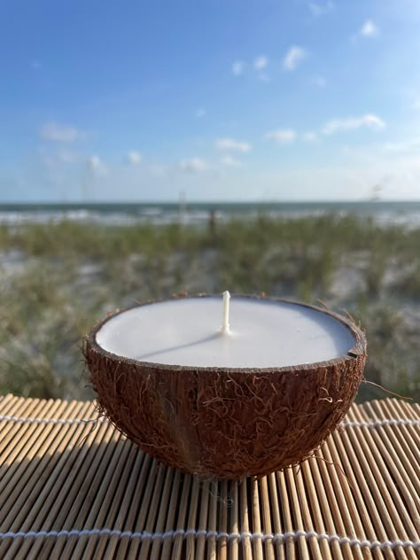 Coconut Soy Candle, a unique candle made from a genuine coconut, hand poured soy wax with a lead-free cotton wick.  Great Centerpiece, Luah themed party, Beach Wedding, Gift for that special friend. Everyone loves candles. Don't forget about yourself, buy one to remember that great beach vacation you took or planning to take.                                     Please choose scent from drop down menu when ordering.                                    Visit my homepage to see all of my great coastal themed soy candles.                                                                   www.etsy.com/shop/cindysoylites                                                                                                 Why Soy? Coconut Themed Party, Themes For Bedrooms, Coconut Decor, Themed Candles, Beach Set Up Ideas, Beach Lamp, Sand Jar, Coconut Candles, Coconut Bowls