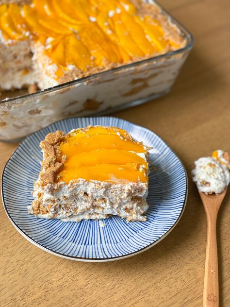 Filipino mango float is a decadent mango dessert filled with sweetened cream, graham crackers and ripe mangos.