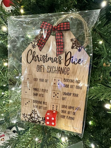 "Fun Christmas party presents swap game. Approximately 6\" x 3\", this tag makes the perfect gift to bring to a work or family gathering. Dice & bow included (color of dice and bow varies)." Ornament Swap Party, Bunco Christmas Ornaments, Cricut Christmas Gifts For Family, Christmas Party Door Prizes, Christmas Gift Card Game, Stocking Stuffers For Adult Children, Adult Christmas Gift Exchange Ideas, Work Christmas Party Decorations, Christmas Bunco Party Ideas