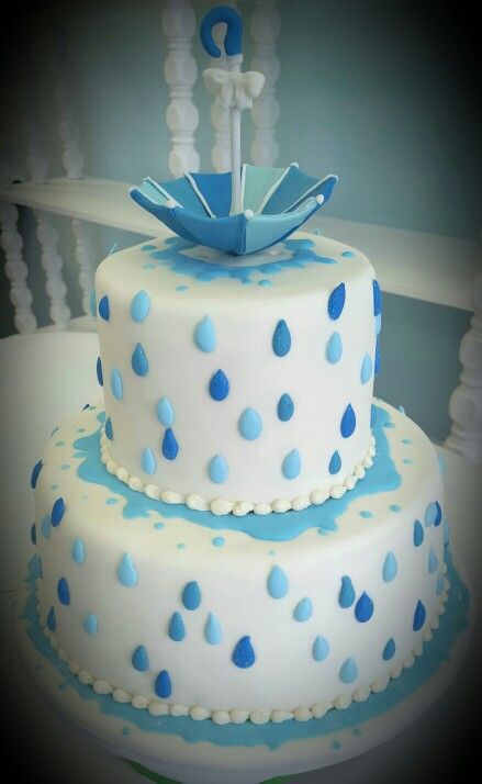 Raindrop Shower cake for a Rain Umbrella themed baby shower by Sweet Grace Anna's.   Matching cookies to follow. Raindrop Baby Shower, Rain Baby Showers, Umbrella Baby Shower, April Baby Shower, Baby Boy Sprinkle, Modern Baby Shower Games, Funny Baby Shower Games, Sprinkle Shower, Baby Shower Prizes