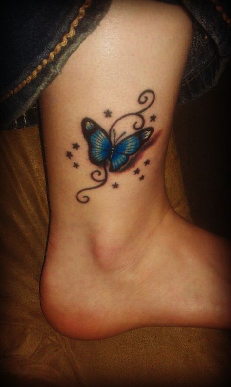 butterfly tattoo Butterfly Tattoos On Ankle, Ankle Butterfly Tattoo, Butterfly Tattoo Ankle, Grandkids Tattoo Ideas, Tattoos On Ankle, Tattoo Ideas Butterfly, Inner Ankle Tattoos, Butterfly Foot Tattoo, Butterfly Ankle Tattoos