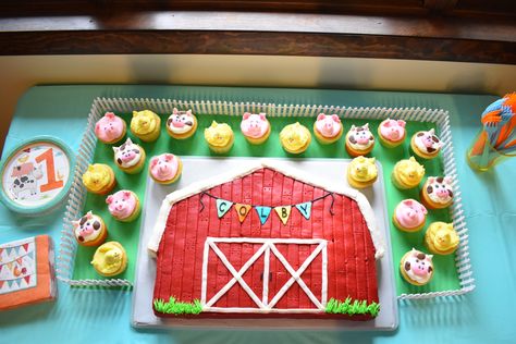 Farm birthday. Barnyard birthday. Farm animal cupcakes. Barn cake. Barnyard animal cupcakes. Farm Animal First Birthday Party Smash Cakes, Barn Cake With Animal Cupcakes, Barnyard Cupcakes Farm Theme, Barnyard Animal Cake, Barnyard Sheet Cake, Barnyard 1st Birthday Cake, Barnyard First Birthday Cake, Farm Theme Sheet Cake, One Year Old Farm Theme Birthday