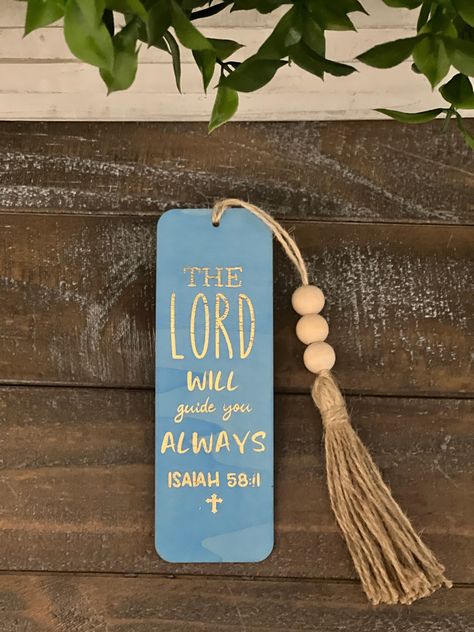 "Our \"The Lord Will Guide you ALWAYS\" ISAIAH 58:11 Bible verse bookmarks make excellent gifts, party favors, stocking stuffers, gifts to give to family, friends, pastures, and anything else you could think of.             These elegant wooden bookmarks with gold foil inscription come in various color options such as; weathered oak, distressed gray, light blue, sky blue, dark blue, coral pink, pink, lilac, purple, lime green, grass green, turquoise, and yellow.             We hope to inspire an Bookmarks For Bible Diy, Christian Handmade Gifts, Christian Acrylic Bookmarks, Diy Wooden Bookmark, Bookmark For Bible, Diy Bible Bookmarks, Bible Bookmarks Diy, Faith Bookmarks, Bible Verse Bookmarks