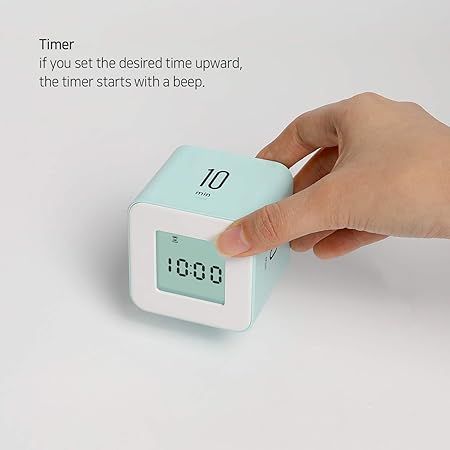 This multifunctional timer offers preset times (1, 3, 5, and 10 minutes) and doubles as a clock. It comes in 5 colors, each with different time settings. LED indicators show elapsed time, and it's easy to use—just flip and turn. A timer alarm and backlight signal when time's up. Its simple cube design complements any room's decor. Study Clock, Clock Timer, Timer Clock, Serving Bowl Set, Elapsed Time, Colorful Home, Cube Design, Balloon Dog, Mothers Day Gifts