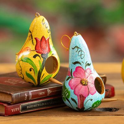 Peruvian artisan Percy Rojas crafts this set of two dried gourd ornaments designed as tiny birdhouses. The artisan grows, harvests, and dries the gourds himself using them in wonderful and creative ways. Each ornament is hand-painted with floral details in vivid colors to brighten any tree or Christmas decor. They can also be used outdoors and make a great gift for bird watchers. | The Holiday Aisle® 2 Piece Hanging Figurine Ornament 4.3 H x 2.6 W x 3.5 D in brownWood | 4.3" H X 2.6" W X 3.5" D Gourd Painting, Birdhouse Gourds, Gourd Ornaments, Gourd Crafts, Gourds Birdhouse, Decorative Gourds, Hand Painted Gourds, Pumpkin Farm, Gourds Crafts