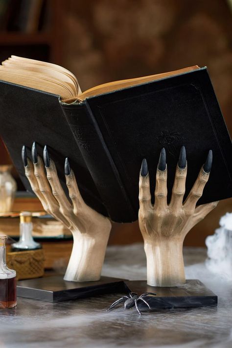 A creepy book stand made up of realistic witch hands that are perfect for holding open grimoires, spell books, a Book of Shadows, the Necronomicon, and more. Gothic Home Decor Ideas, Hand Holding Something, The Necronomicon, Staff Magic, Creepy Witch, Creepy Hand, Witch Accessories, Myths & Monsters, Witch Hands