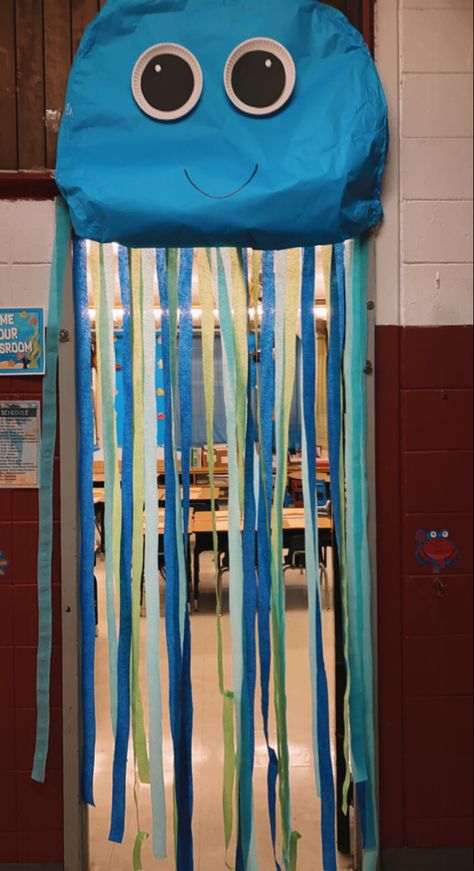 Under the sea classroom theme jelly fish streamers blue green Jellyfish Door Decoration, Ocean Theme Preschool Decorations, Under The Sea Door Decorations Classroom, Under The Sea Hallway, Ocean Decorations For The Classroom, Under The Sea Decorations Ocean Themes, Under The Sea Hallway Decorations, Ocean Theme Door, Under The Sea Classroom Door