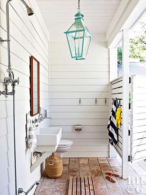 white wooden outdoor shower with ceramic floor Outdoor Pool Bathroom, Outdoor Shower Ideas, Pool Organization, Addition Plans, Pool House Bathroom, Fireplace Patio, Outdoor Shower Enclosure, Living Pool, Outdoor Bathroom Design