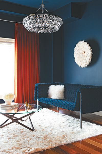 5 most popular paint colours across Canada - Chatelaine Navy Blue And Burnt Orange Living Room, Navy And Burnt Orange Living Room, Orange Interior Design, Blue And Orange Living Room, Burnt Orange Living Room, Orange Living Room, Orange Rooms, Dark Paint, Living Room Orange