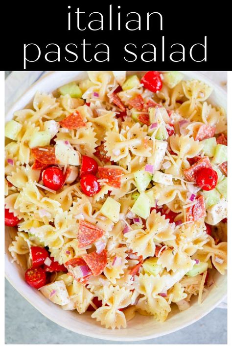 Italian Pasta Salad is an easy pasta salad recipe made with bowtie pasta, pepperoni, cucumber, tomatoes, onions, mozzarella and parmesan cheese, and Italian dressing. This is perfect for a summer picnic or BBQ side dish! Pasta With Italian Dressing, Pasta Pepperoni, Italian Dressing Pasta Salad, Bowtie Pasta Salad, Crockpot Side Dishes, Classic Macaroni Salad, Classic Pasta Salad, Salad Cucumber, Italian Pasta Salad