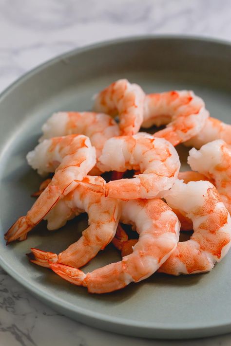 Boiling shrimp is one of the quickest and easiest methods of cooking shrimp. And they're perfect for classic shrimp cocktail, shrimp salsa, for sushi rolls and more! The best part it takes less than 5 minutes. Raw Peeled Shrimp Recipes, Cook Raw Shrimp On Stove, Boiled Shrimp Recipe Easy, Louisiana Boiled Shrimp, How To Cook Jumbo Shrimp, Best Boiled Shrimp Recipe, How To Boil Shrimp For Shrimp Cocktail, Boiling Shrimp For Shrimp Cocktail, Boiled Shrimp On The Stove