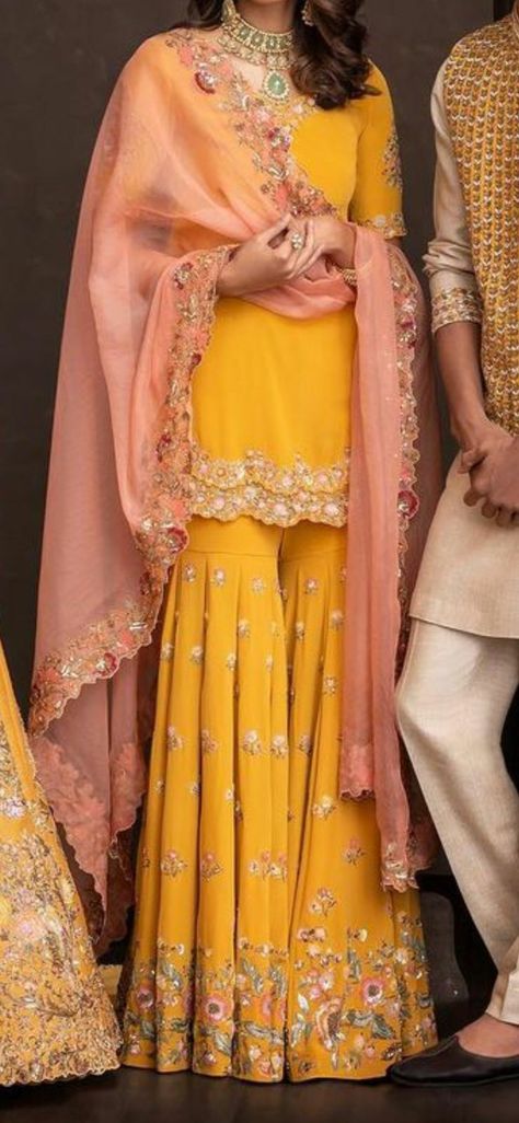 Haldi Ceremony Outfit Pakistani Style, Jaggo Outfit Punjabi Suit Yellow, Haldi Ceremony Outfit For Sister Yellow Kurti, Yellow And Pink Outfit Indian, Trendy Haldi Outfits For Bride, Manjha Ceremony Dresses, Yellow And Pink Sharara, Haldi Outfit Inspo For Bride, Punjabi Haldi Ceremony Outfit