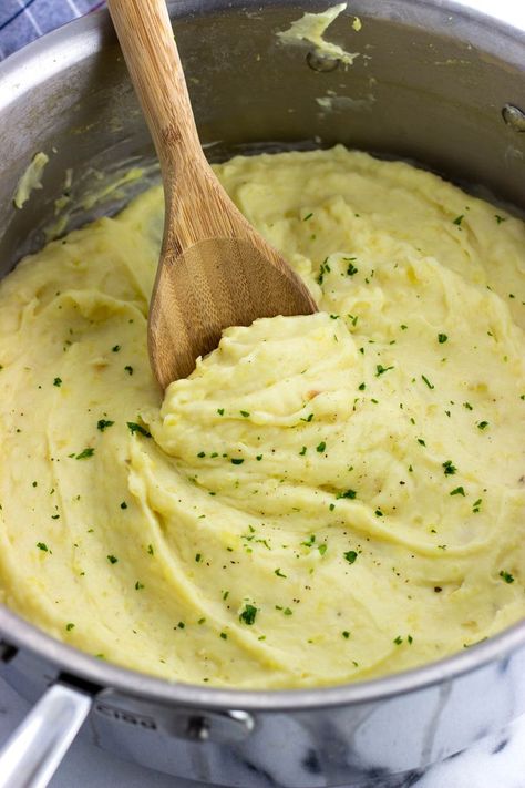 A pot full of mashed potatoes with a wooden serving spoon plunged in. Garlic Mash Potato Recipes, Meal Ideas For A Crowd, Healthy Side Dishes For Chicken, Mash Potato Recipes, Garlic Mash, Garlic Mashed Potatoes Recipe, Holiday Meal Ideas, Mash Potato, Roasted Garlic Mashed Potatoes