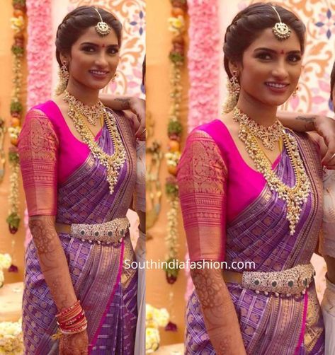 For one of the post-wedding events, Shalini Kandukuri wore a purple Kanjeevaram saree that featured elephant and peacock motifs all over paired with a contrast pink blouse. She finished off her look with traditional jewellery and a center-parted braid enhanced with flowers! Shalini Kandukuri, Blouse For Silk Saree, Pink Kanjeevaram Saree, Hair Style On Saree, Bridal Sarees South Indian, Blouse Designs Catalogue, Indian Bridal Sarees, Pattu Saree Blouse Designs, Saree Jewellery