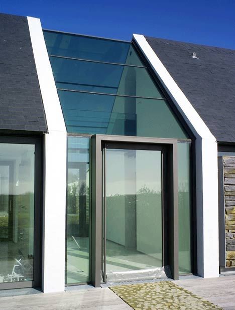 The dark roof, stacked stone and light walls is a great colour mix Glass Walkway, Houses Architecture, Building A Porch, House Extension, Island House, House With Porch, Glass Roof, Modern Barn, House Extensions