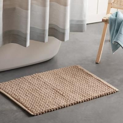 No one wants to get out of the shower and step out onto a cold floor! Set your tootsies up for comfort with this stylish and practical Beige bath mat. With a super absorbent woven texture it'll add interest to your bathroom's 5th wall - the floor! Made from a soft cotton/polyester blend this beautiful essential is easy to maintain. Natural Bathroom Rug, Woven Bath Mat, Jute Bath Mat, Bath Mat Aesthetic, Bathroom Mats & Rugs, Shower Mat Ideas, Shower Rug Bath Mats, Bath Mat Ideas, Wood Bath Mat