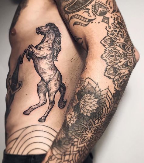 by lesyale_ #tattoo #horse #body #hand #pattern Men’s Horse Tattoo, Stallion Horse Tattoo, Back Horse Tattoo, Roman Horse Tattoo, Masculine Horse Tattoo, Horse Tattoos Men, Woodcut Horse Tattoo, Wild Horse Tattoo Design, Horse Arm Tattoo