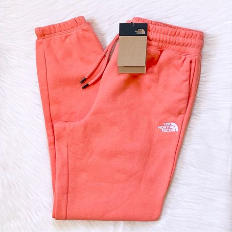 New With Tags- The North Face Women’s Half Dome Fleece Sweatpants In Coral Sunrise / Tnf White With Elastic Waistband With Drawstrings, Side Hand Pockets And Elastic Cuffs. 73% Cotton, 27% Polyester. Standard Fit. Measurements: (Xs) Waist 26.5”, Rise 11.5”, Inseam 27.5”. (S) Waist 28”, Rise 12”, Inseam 28”. (M) Waist 31”, Rise 12.25”, Inseam 29”. (L) Waist 34”, Rise 13.5”, Inseam 29”. (Xl) Waist 37”, Rise 13.5”, Inseam 29”. (Xxl) Waist 40”, Rise 14”, Inseam 29.5”. Trendy Pink Relaxed Fit Sweatpants, The North Face Sweatpants, Pink Cotton Sporty Sweatpants, Cheap Pink Full-length Sweatpants, Colored Sweatpants, Aviator Nation Sweatpants Pink, Nike Winter Jackets, Nike Hoodie Outfit, High-waisted Pink Sweatpants With Elastic Waistband