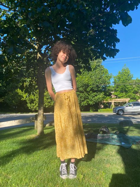 long yellow skirt with white tank top and black and white converse Yellow Flowy Skirt Outfit, Yellow Skirt Outfit Aesthetic, Yellow Skirt Aesthetic, Yellow Long Skirt Outfit, Indie Skirt Outfit, Yellow Midi Skirt Outfit, Long Skirt Poses, Yellow Maxi Skirt Outfit, White Tank Outfit