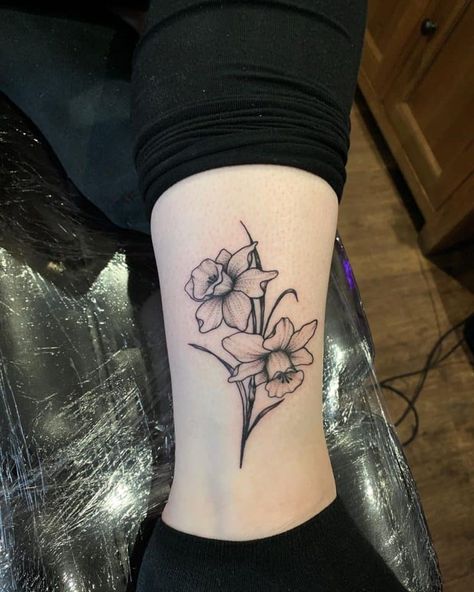 Daffodil Tattoo On Hand, Orchid And Daffodil Tattoo, Daffodil Tattoo Shaded, Masculine Daffodil Tattoo, Daffodil Tattoo Leg, Daphodil Tattoos, Daffodil Tattoos For Women, Naricuss Flower Tattoo, Two Daffodils Tattoo